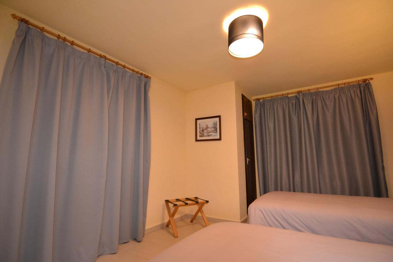 Apartamentos Turisticos Poblado Аринсал Екстериор снимка